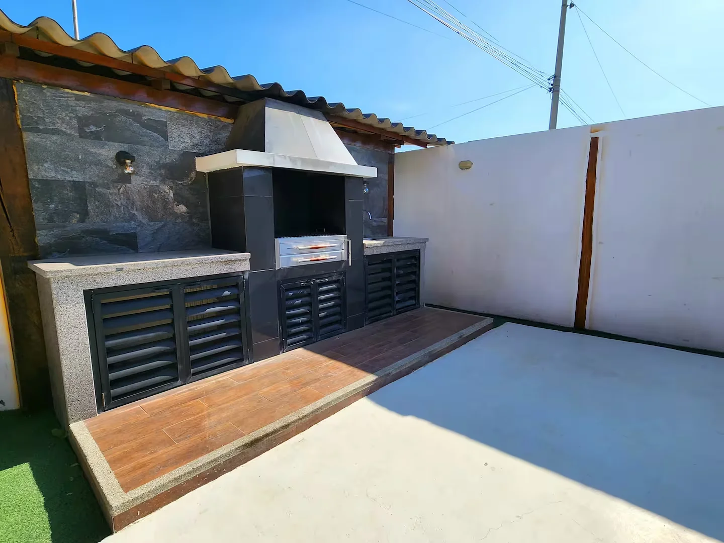 Rustic House — zona BBQ